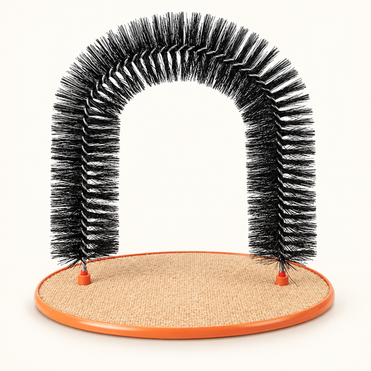 Black bristle grooming arch on an oval tan scratch pad with an orange rim, on an off-white background.