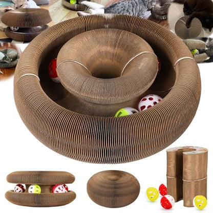 Cardboard cat toy with multiple levels and interactive elements on a white background