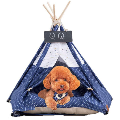 Pet teepee with star pattern and a sleeping dog inside
