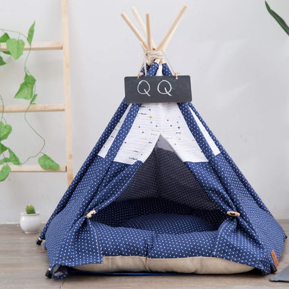 Pet teepee with star pattern and a sleeping dog inside