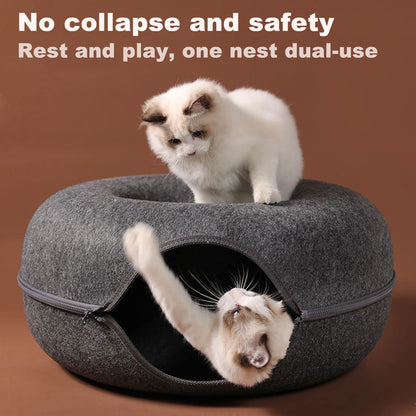 Two cats using a gray donut-shaped pet bed with text about its features.